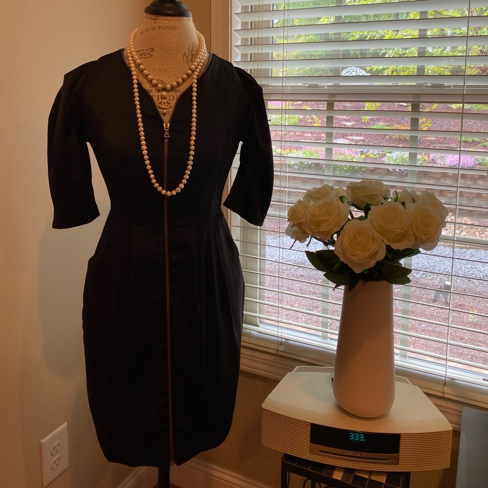 Beautiful dress! Very well made! Still a good condition!